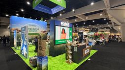 Custom booth with turf floor at CCW Las Vegas 2026